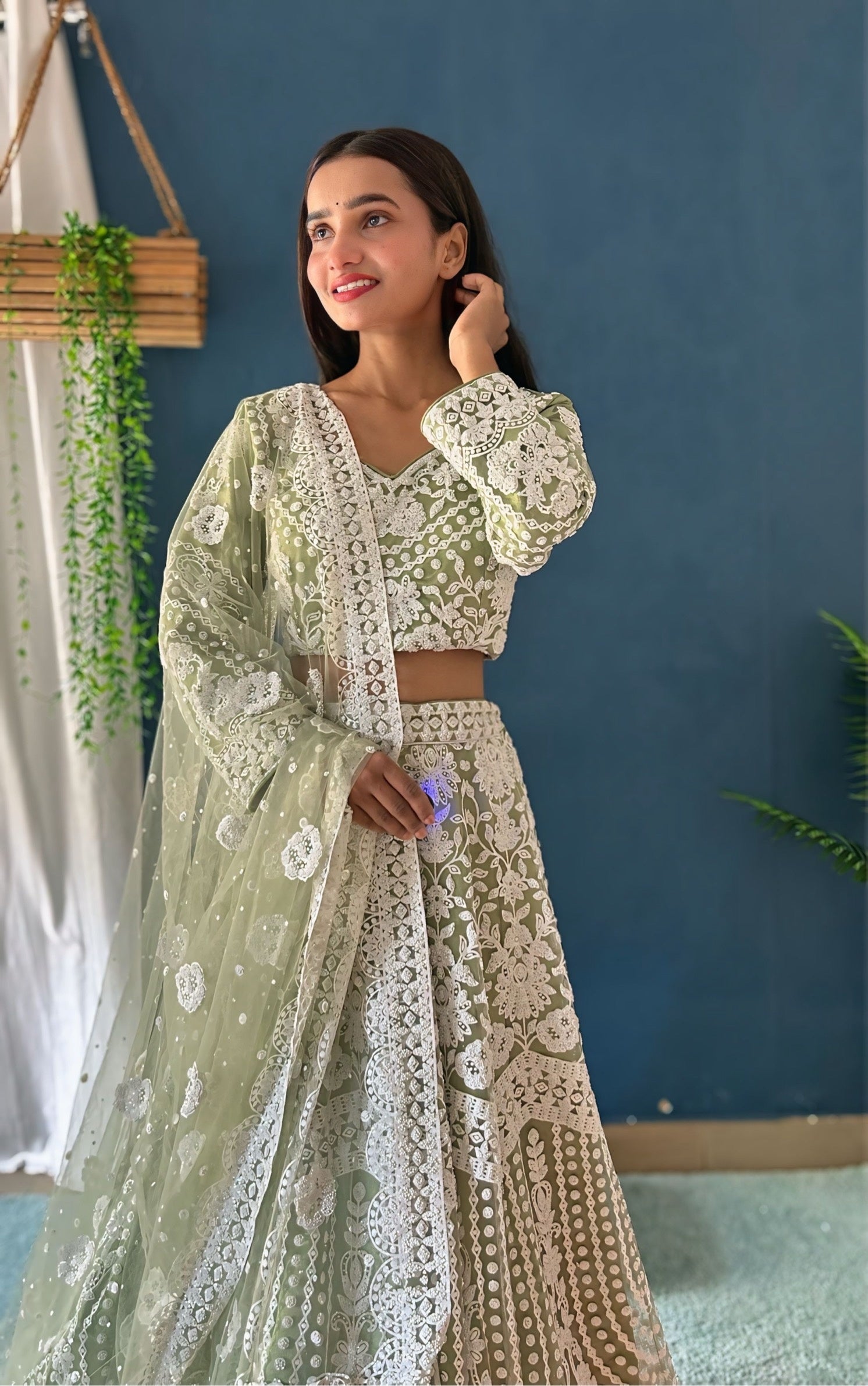 Wonderful Pastel Green Pure Bitts Pearl Designer Net Heavy Bridal Lehenga Choli with Amazing Dupatta