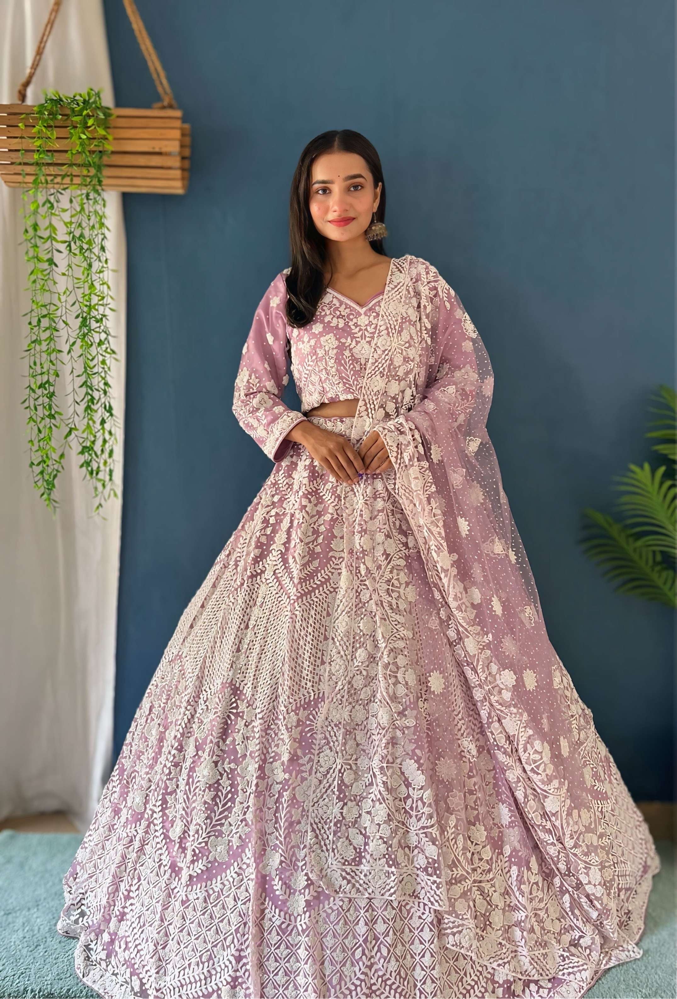 Rich Pink Pure Bitts Pearl Designer Heavy Net Reception Wear Lehenga Choli & Pearl Designer Dupatta