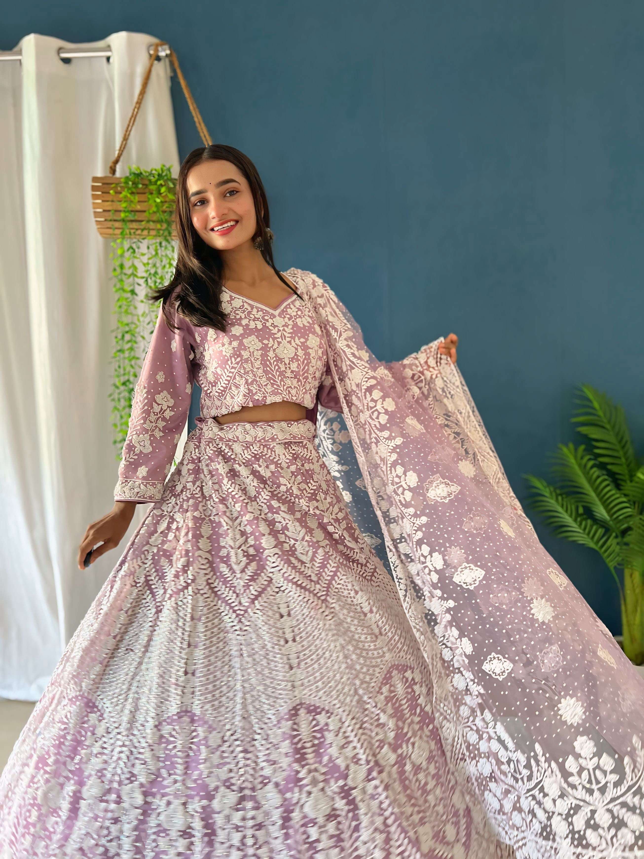 Rich Pink Pure Bitts Pearl Designer Heavy Net Reception Wear Lehenga Choli & Pearl Designer Dupatta