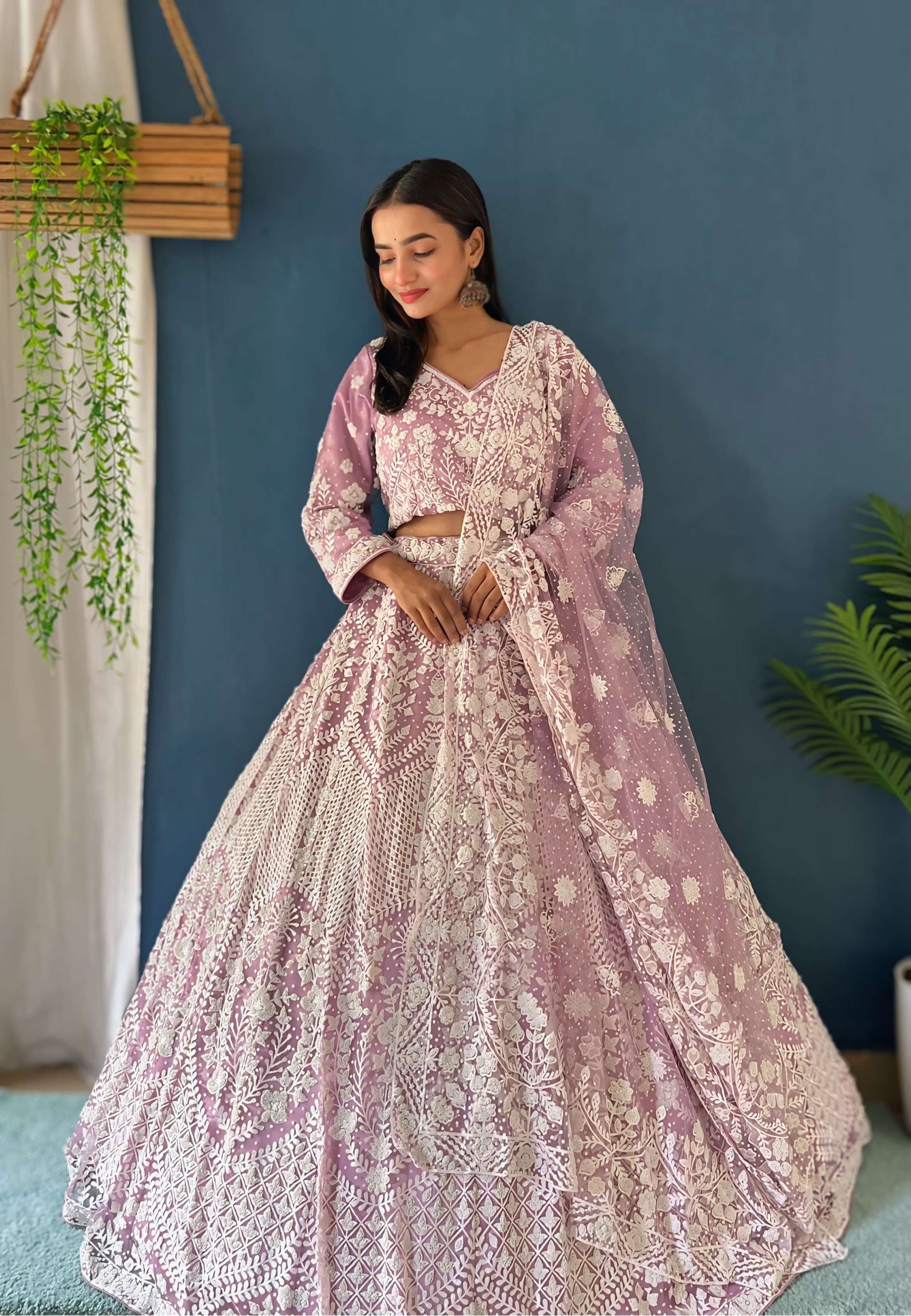 Rich Pink Pure Bitts Pearl Designer Heavy Net Reception Wear Lehenga Choli & Pearl Designer Dupatta