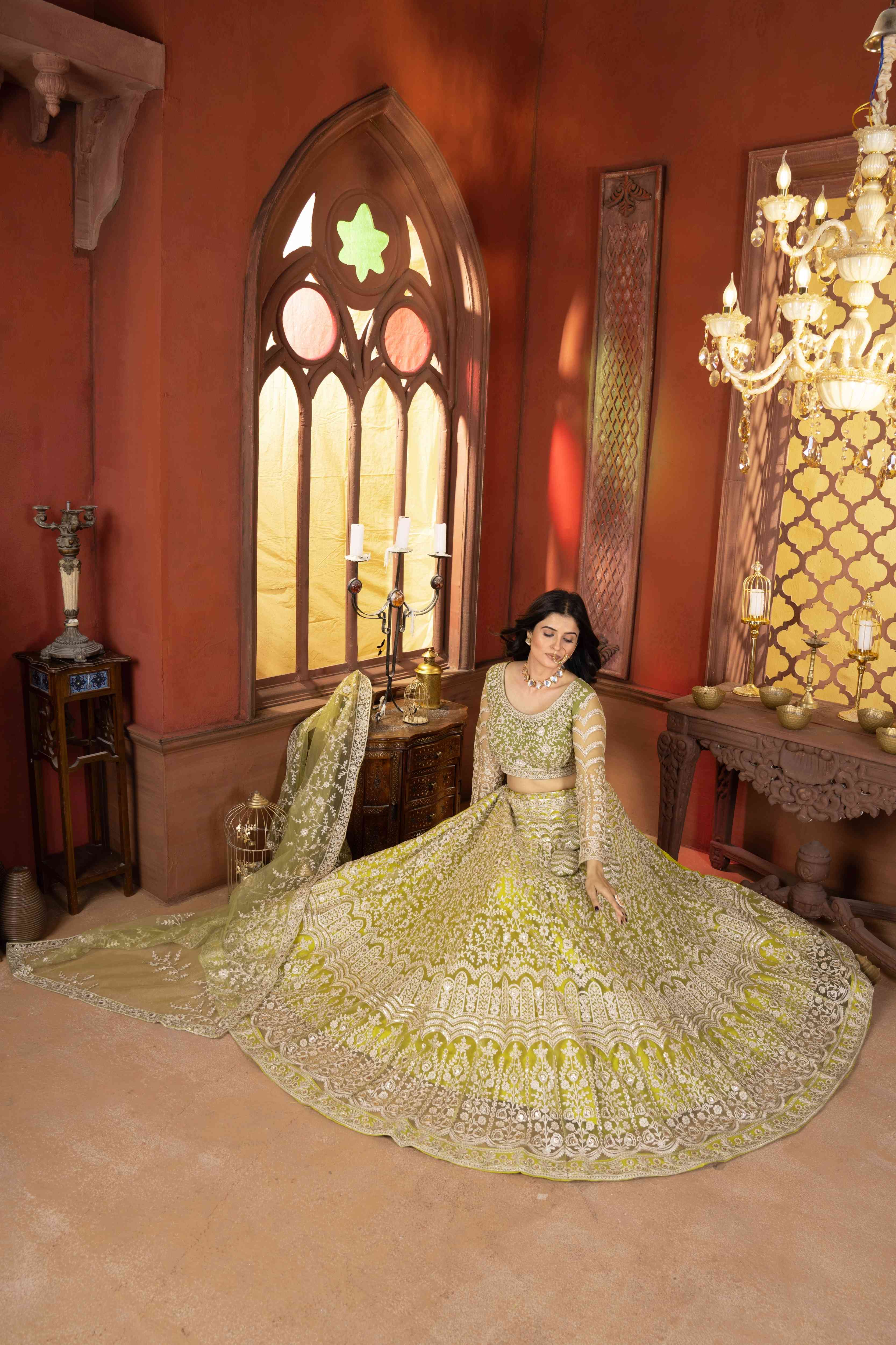 Mesmerizing Olive Green Net Mehndi Wear Embroidered Designer Lehnga Choli With Dupatta