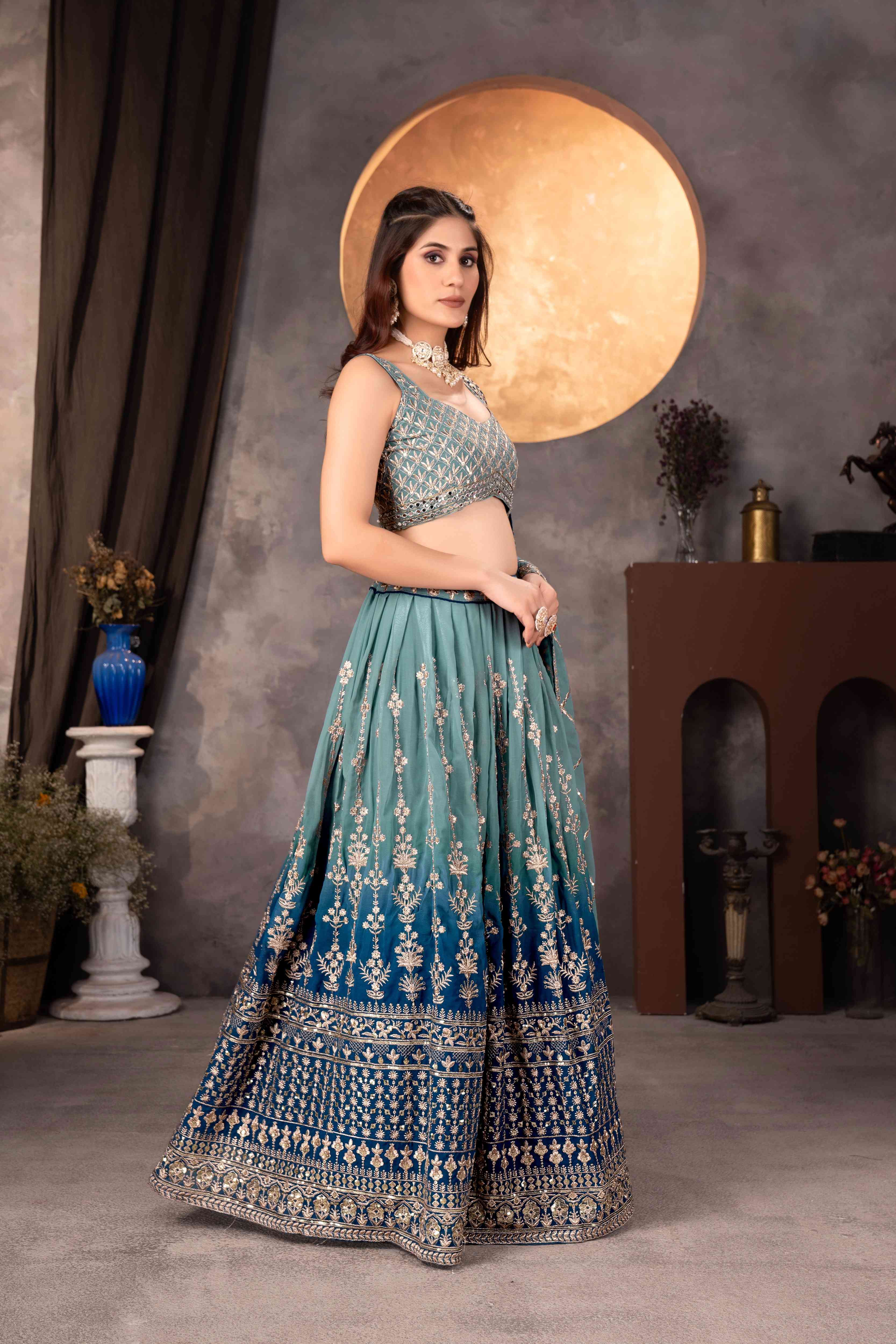 Attractive Teal Blue Embroidered Reception Wear Lehenga Choli With Dupatta