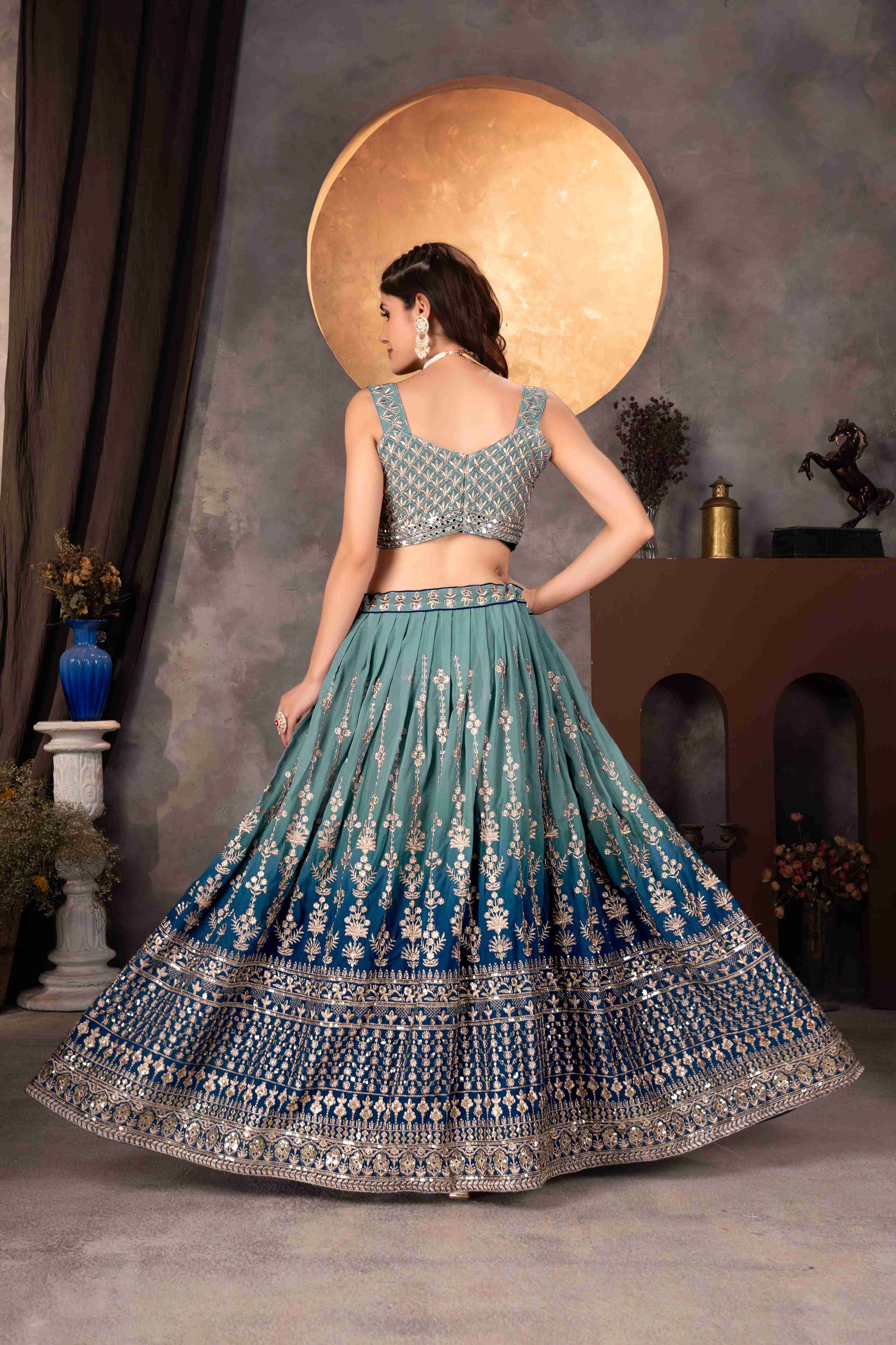 Attractive Teal Blue Embroidered Reception Wear Lehenga Choli With Dupatta