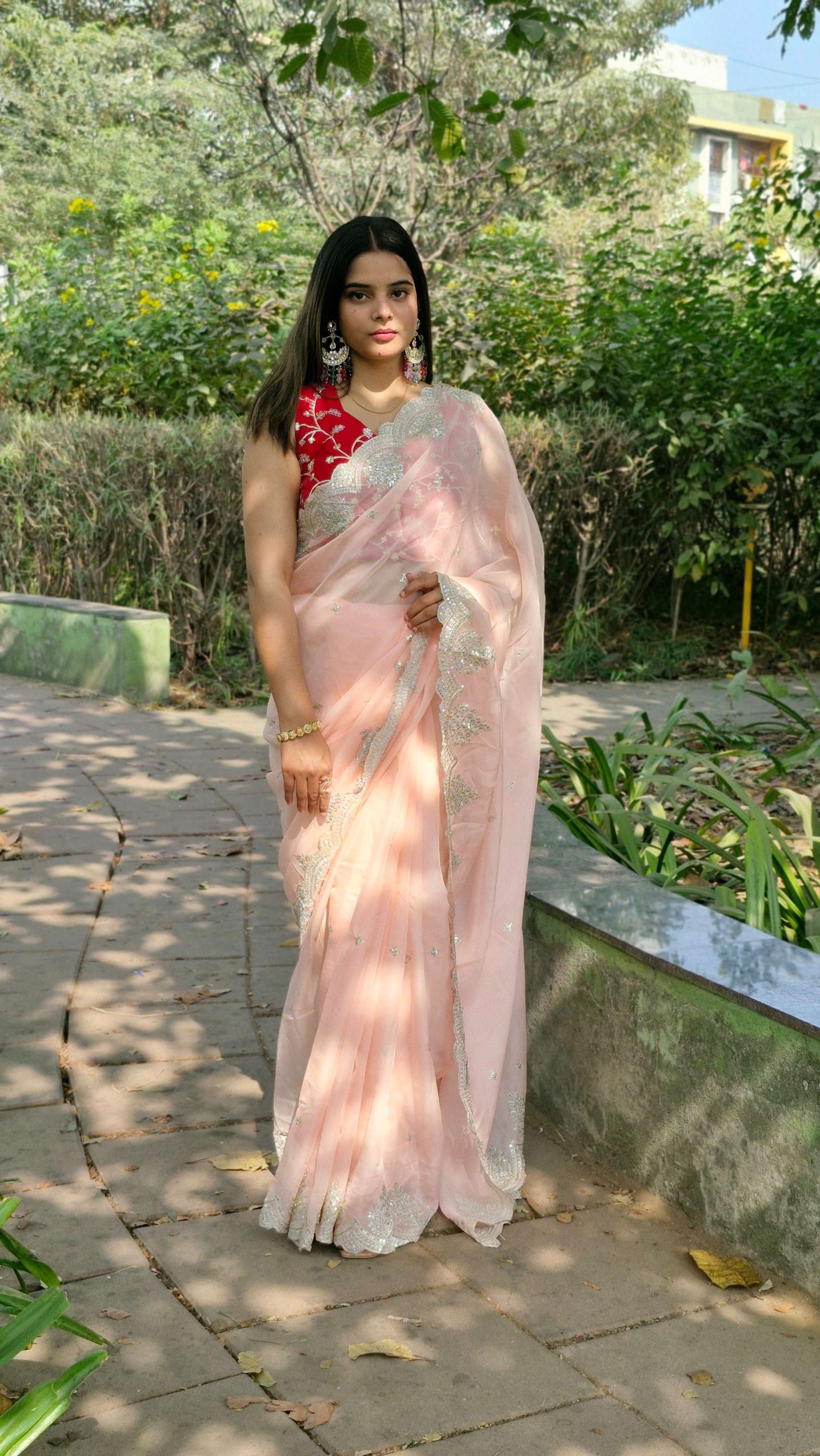 Precious Blush pink Tabby Organza Silk Engagement Wear Saree With Red Embroidered Blouse