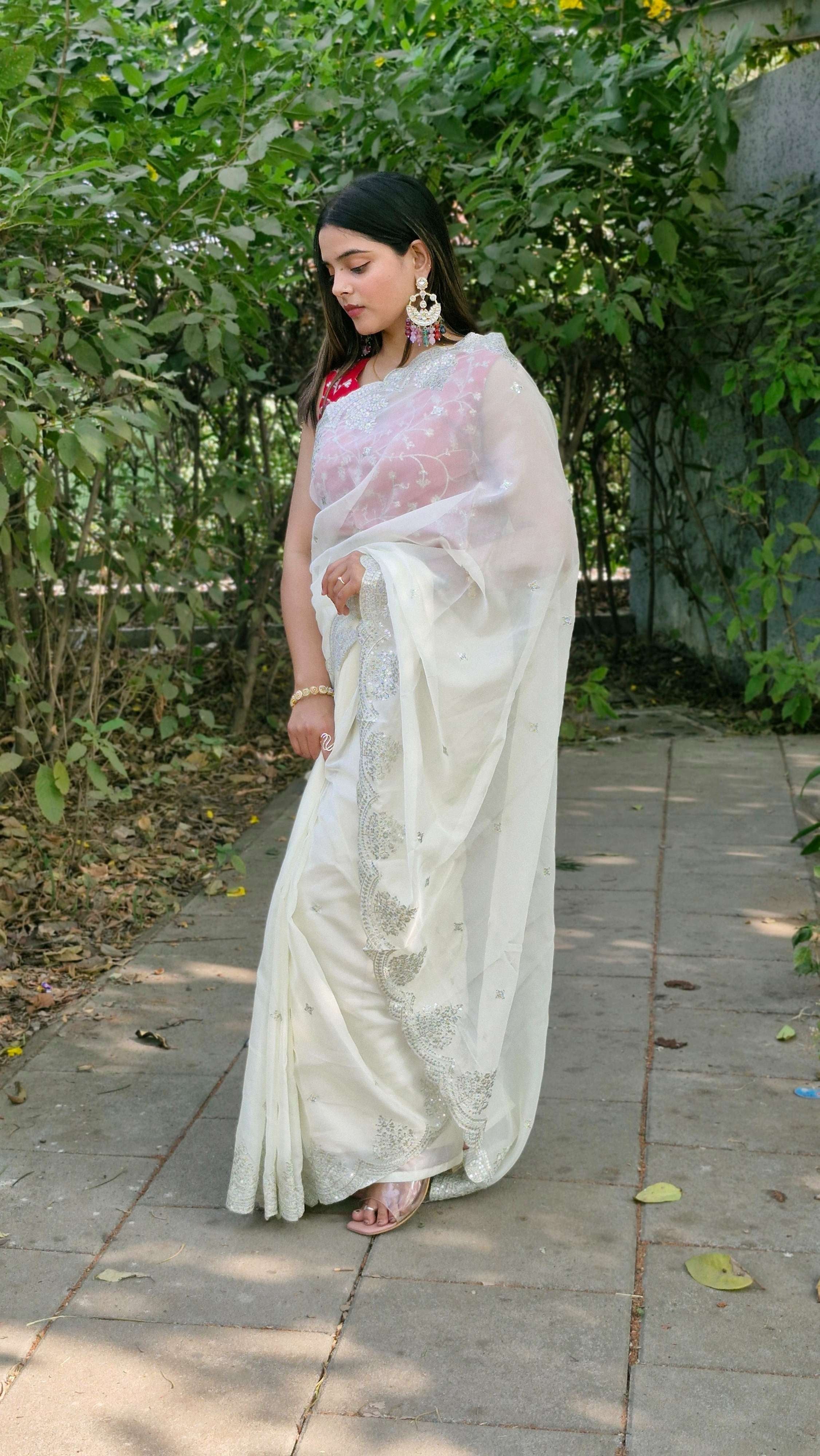 Stunning White Tabby Organza Silk Engagement Wear Saree With Red Embroidered Blouse
