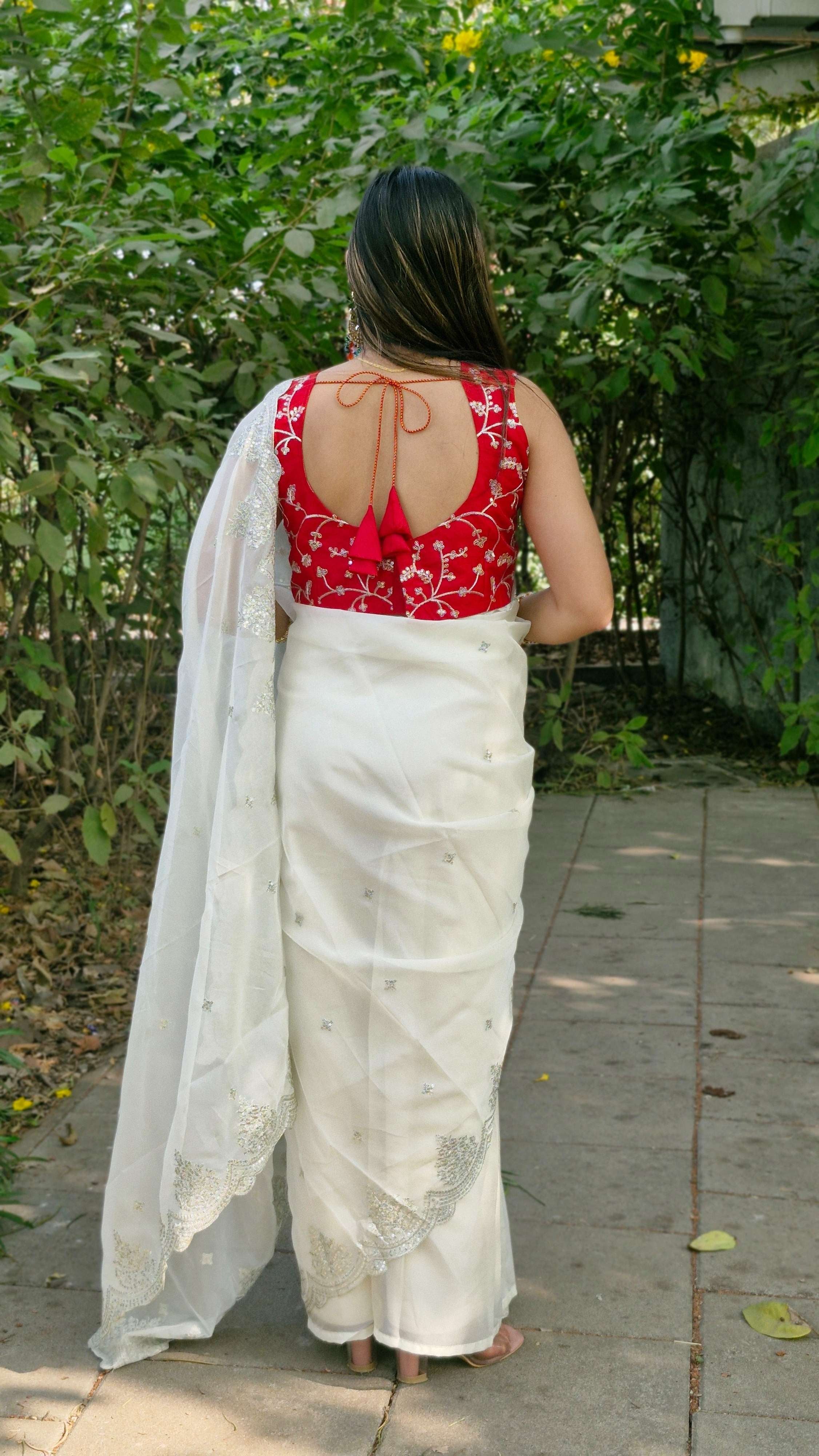 Stunning White Tabby Organza Silk Engagement Wear Saree With Red Embroidered Blouse